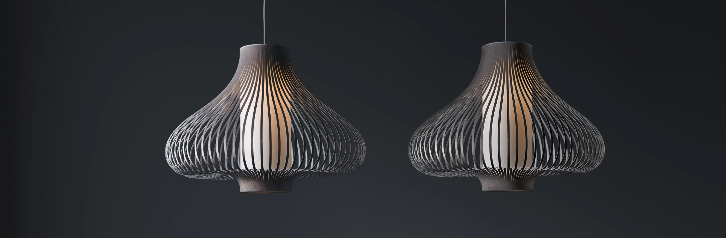 Elegant dining area with a modern chandelier, table lamps, and framed artwork, creating a sophisticated and cozy atmosphere.