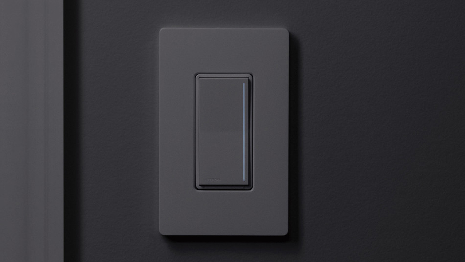 Sleek silver Lutron wall switch with buttons labeled "Open," "Preset," and "Close," next to a window with a grey shade.